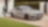 Μια λευκή BMW M3 σταθμευμένη σε μια διαδρομή με έναν άνδρα να περπατά προς το μέρος της – λευκό σπίτι στο βάθος